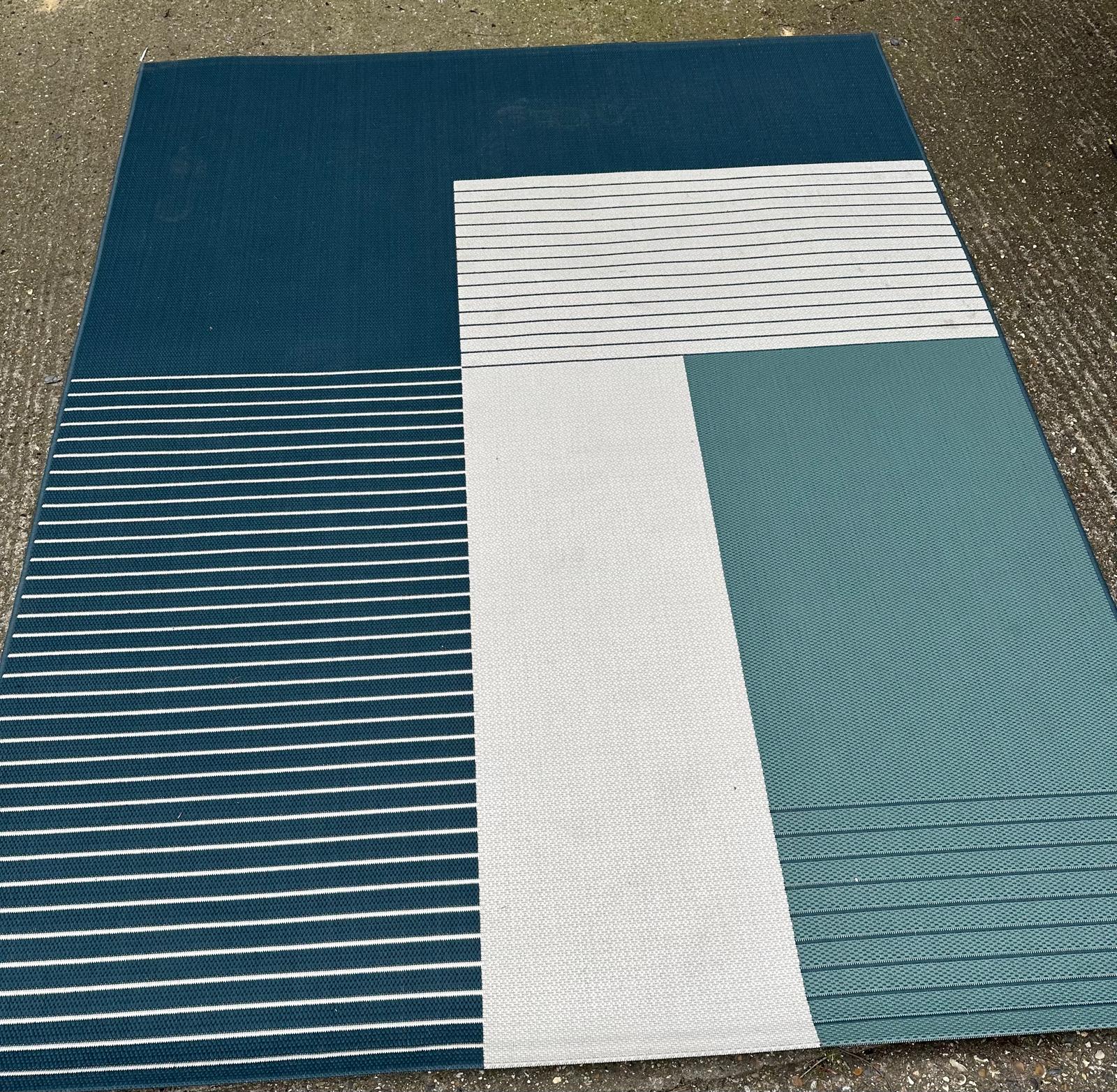 A contemporary rug in blue, green and beige 200cm x 250cm