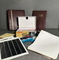 A selection of philatelic accessories to include blank albums and sheets, stamps mounts and a uv