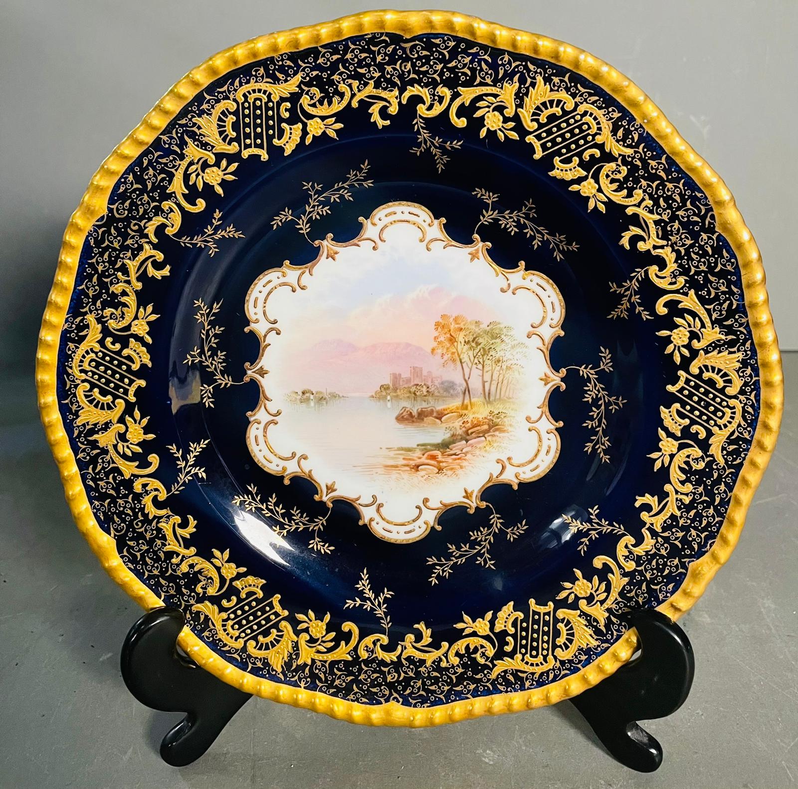 A selection of five early 20th century Coalport hand painted plates with blue grounds, under an acid - Image 5 of 12