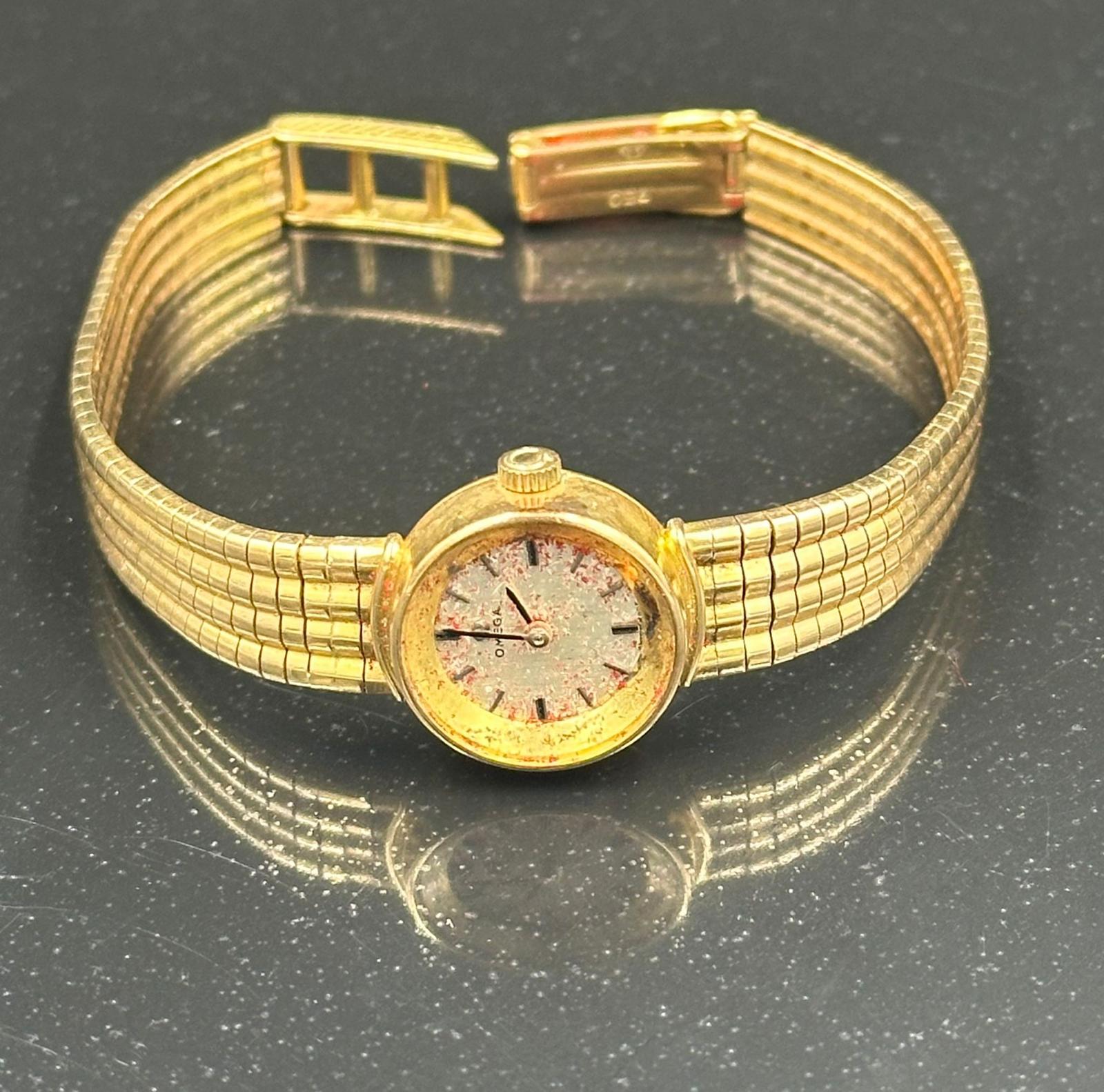 An 18ct gold ladies Omega watch AF with an approximate total weight of 30.6g