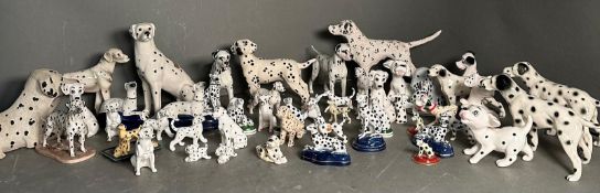 An extensive collection of ornamental dalmatians various makers to include Beswick