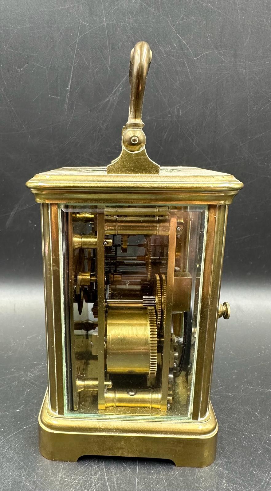 A French brass cased carriage clock with glass panes to side and back - Image 4 of 5