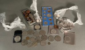 A selection of Great British coins, various denominations and conditions.