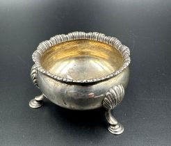 A hallmarked silver cruet on three shell feet by F B Thomas & Co London 1895