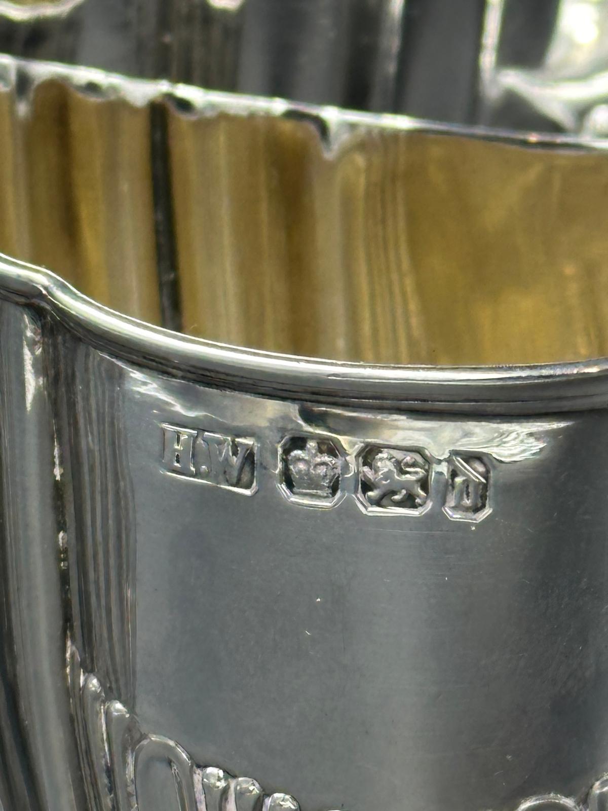 A three piece silver tea service by Lee & Wigfull with a semi fluted design hallmarked for Sheffield - Image 2 of 3