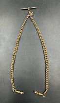 A 9ct gold Albert chain, curb link chain with lobster clasps and T - Bar attachment (Total weight