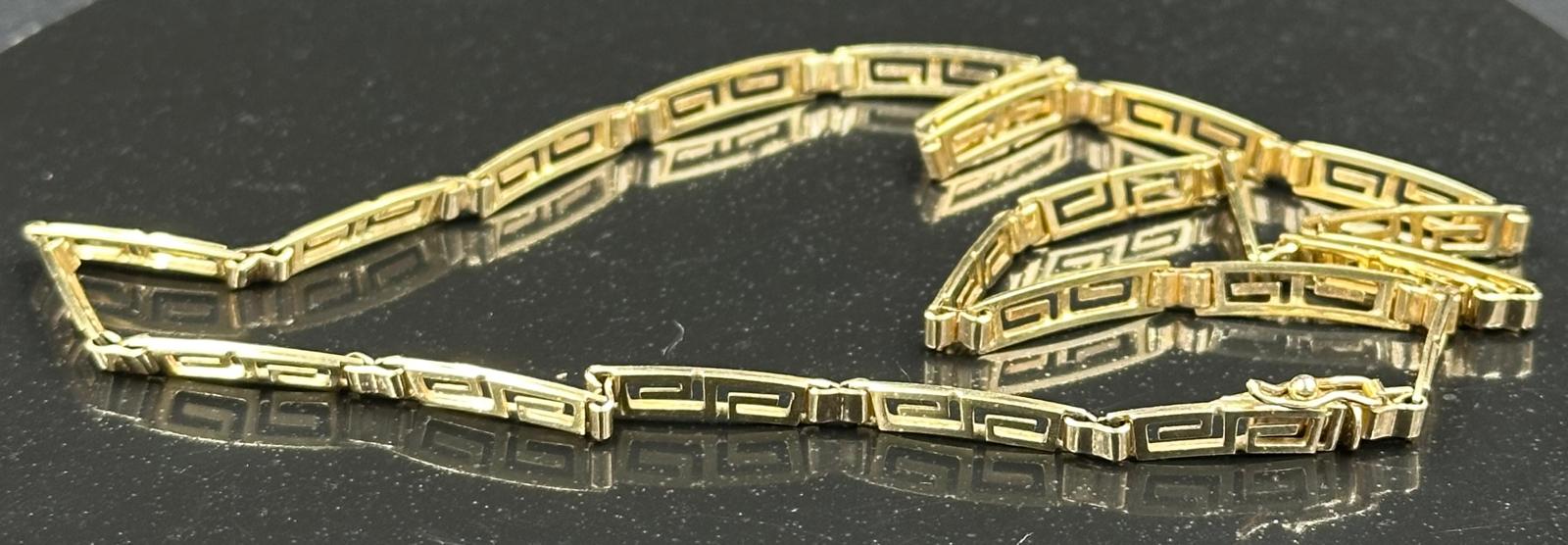 A Greek key designed necklace in yellow gold marked 585, with an approximate total weight 11.9g - Image 2 of 2