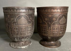 A matching pair of Indo Persian design vases or cups.