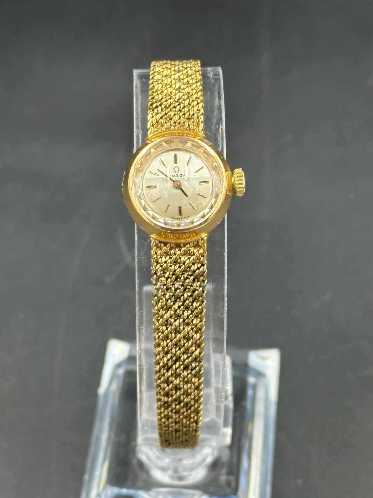 An 18ct gold Ladies Omega watch with an approximate total weight of 27.1g