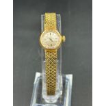 An 18ct gold Ladies Omega watch with an approximate total weight of 27.1g