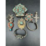 A selection of native American jewellery to include pendants and bangles