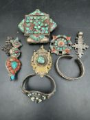 A selection of native American jewellery to include pendants and bangles