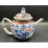 A Chinese globular tea pot with Imari cartouche decoration