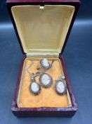 A three piece Cameo set, ring, earrings and a necklace 260g