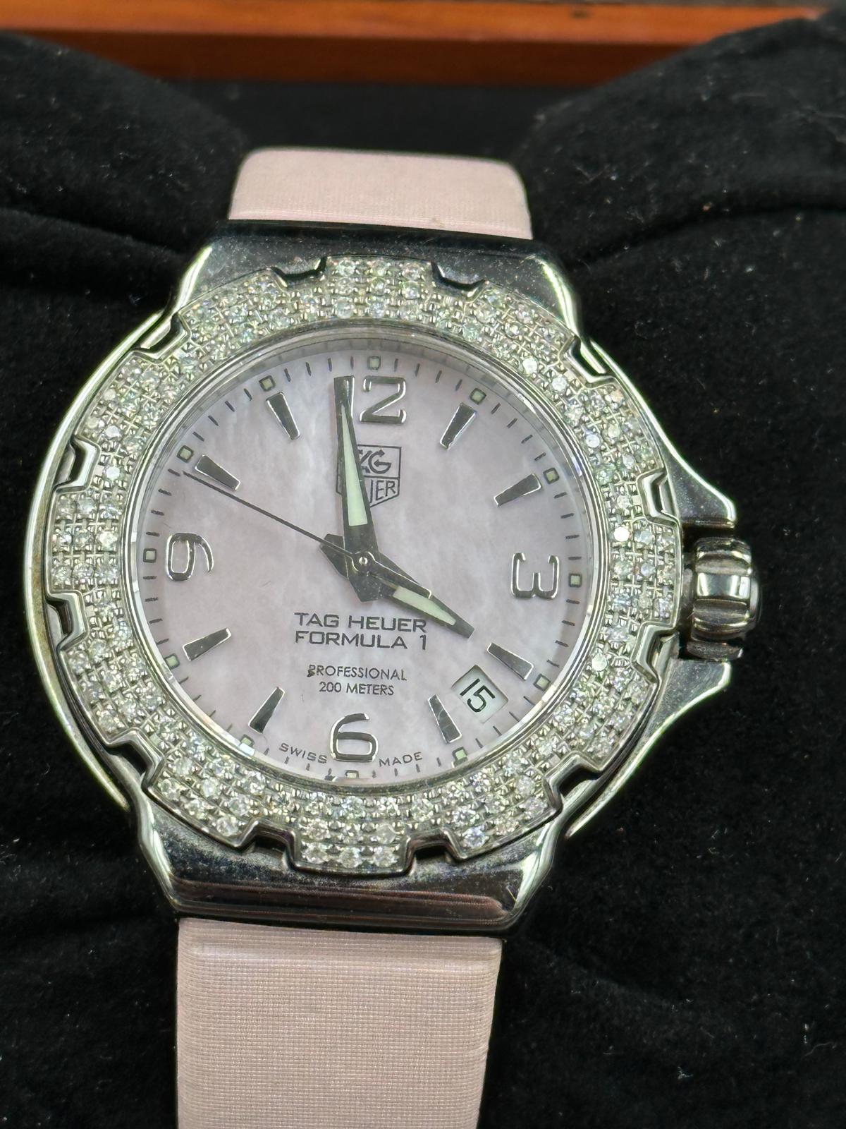 A Ladies Tag Heuer Formula 1 watch with diamond bezel, box and papers on pink leather strap with - Image 3 of 6