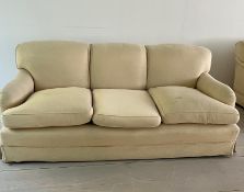 Three seater cream sofa by Peter Dudgeon (W210cm D98cm SH49cm)