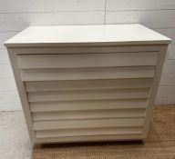 A white painted four drawer chest of drawers AF (H66cm W82cm D33cm)