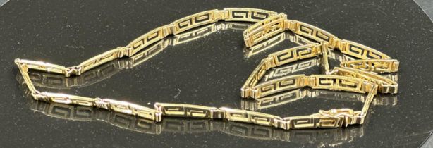 A Greek key designed necklace in yellow gold marked 585, with an approximate total weight 11.9g