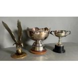 A selection of three trophies to include a brass eagle