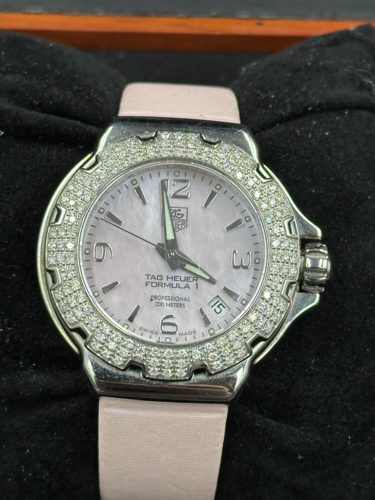 A Ladies Tag Heuer Formula 1 watch with diamond bezel, box and papers on pink leather strap with - Image 4 of 6