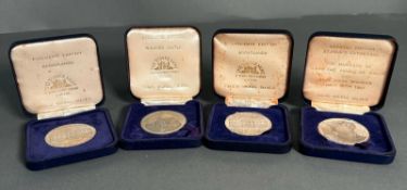 Four commemorative medals to include Broadlands, Windsor Castle and The Marriage of The Prince of