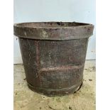 An oval copper planter (H59cm W62cm D48cm)