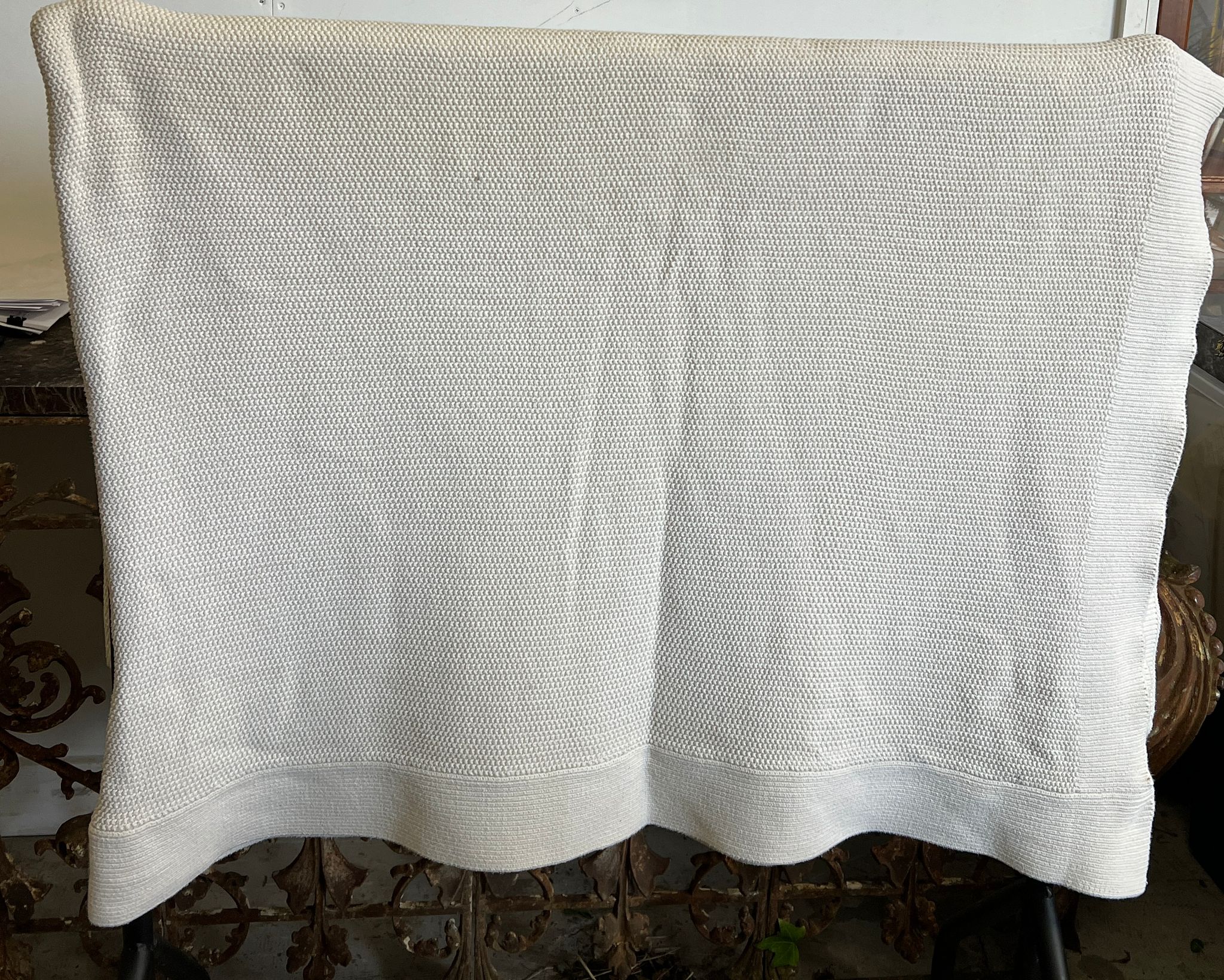 A white knitted Ralph Lauren throw 275cm x 230cm Condition Report pull to one side, no marks, no