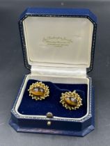 A pair of fabulous Tigers Eye 9ct gold cuff links, hallmarked in London and with an approximate