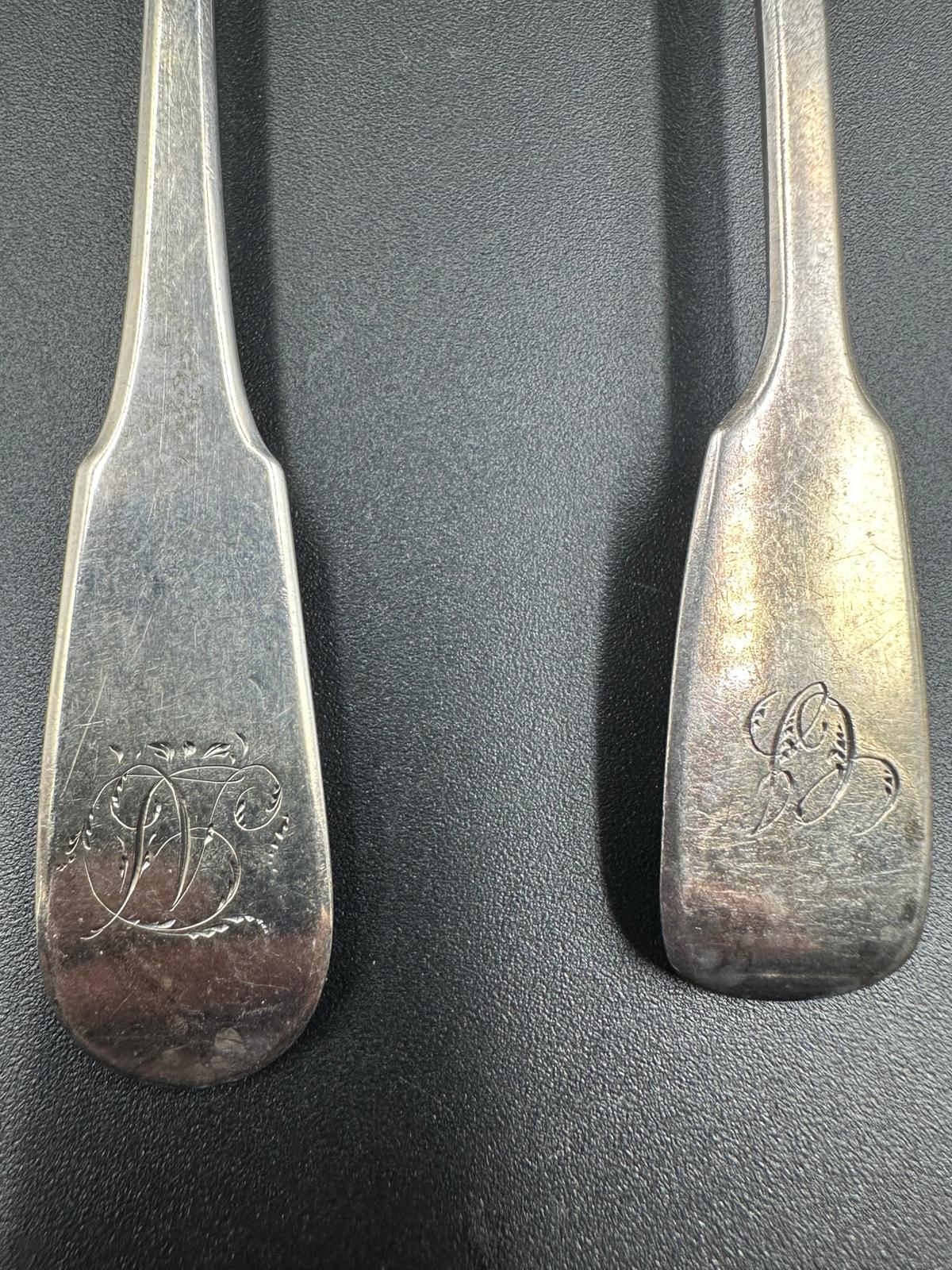 A selection of four silver teaspoons: Two hallmarked for London by Henry Holland 1874, another - Image 4 of 4