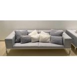 A grey outdoor sofa by B &B Italia outdoor spring time (H73cm W260cm D97cm)