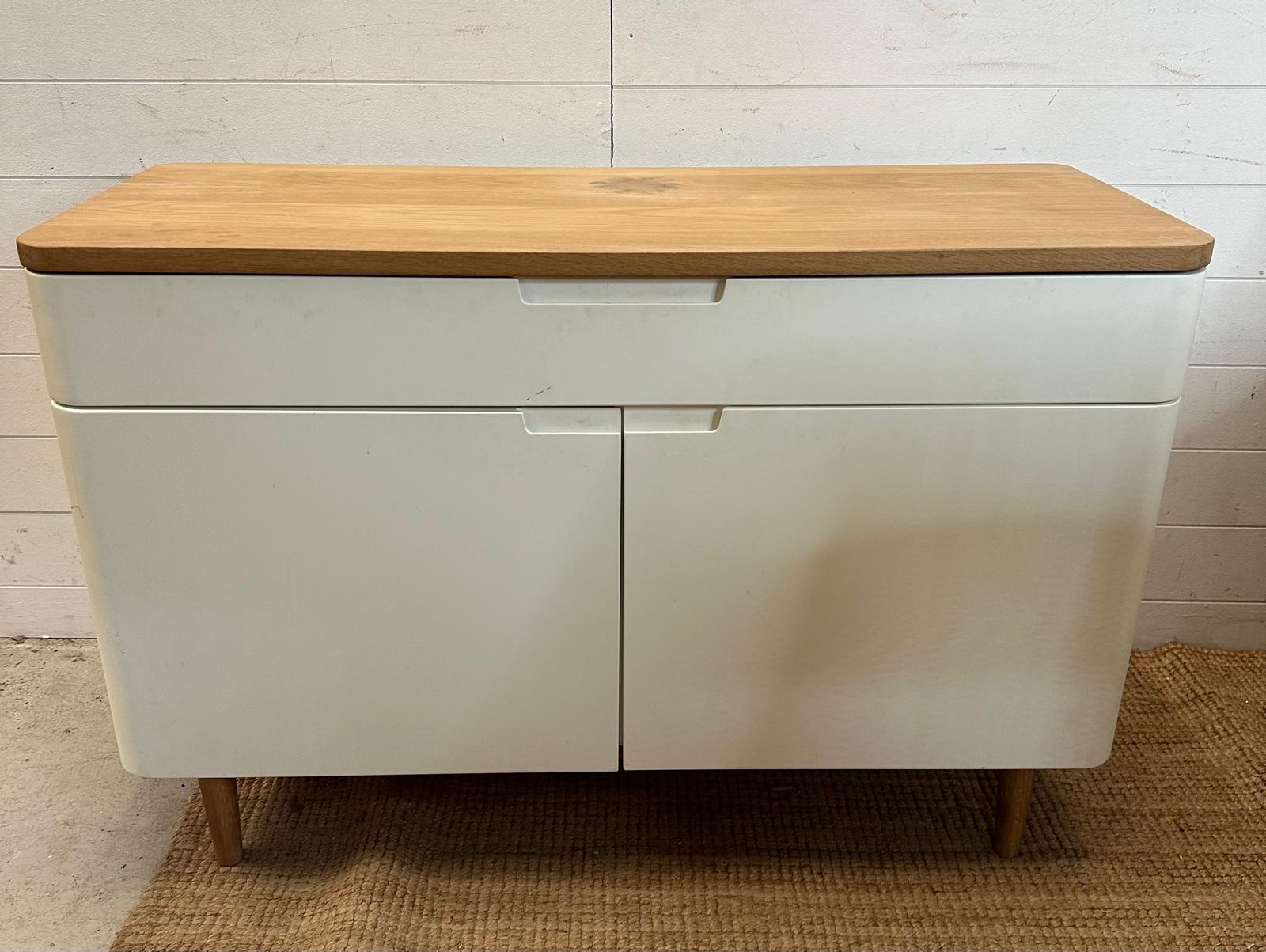 A contemporary side cabinet with long drawer over cupboard (H75cm W115cm D44cm)