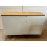 A contemporary side cabinet with long drawer over cupboard (H75cm W115cm D44cm)