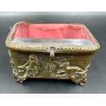 An antique French, bevelled edge glass topped jewellery box with hunting scene decoration.