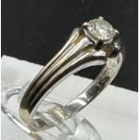 A 0.27ct diamond ring on 18ct gold setting, approximate size N and weight 3.3g