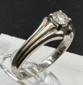 A 0.27ct diamond ring on 18ct gold setting, approximate size N and weight 3.3g