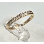 A 9ct gold partial eternity diamond ring with an approximate weight of 1.6g