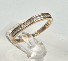 A 9ct gold partial eternity diamond ring with an approximate weight of 1.6g