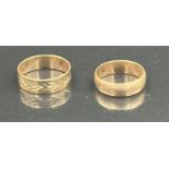 A 14ct gold wedding band, approximate total weight 2.3g and a 9ct gold wedding band approximate