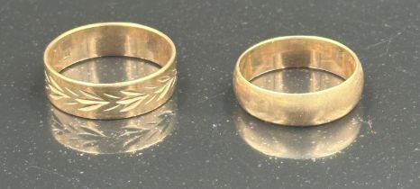 A 14ct gold wedding band, approximate total weight 2.3g and a 9ct gold wedding band approximate
