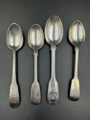 A selection of four silver teaspoons: Two hallmarked for London by Henry Holland 1874, another