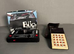 A vintage Blip digital game and a cased Rockwell calculator