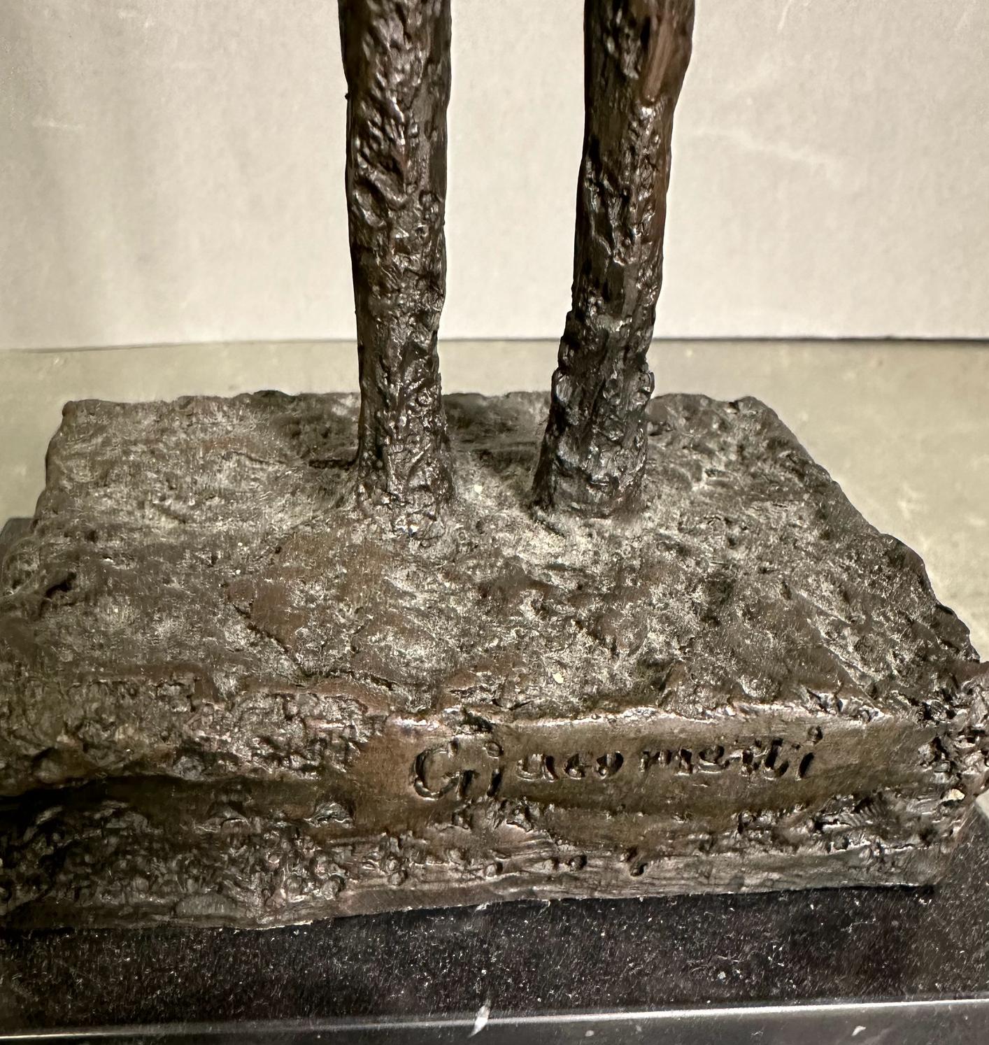 A bronze sculpture of The Tall Man in a marble plinth and signed Giacometti to base H47cm - Image 2 of 4