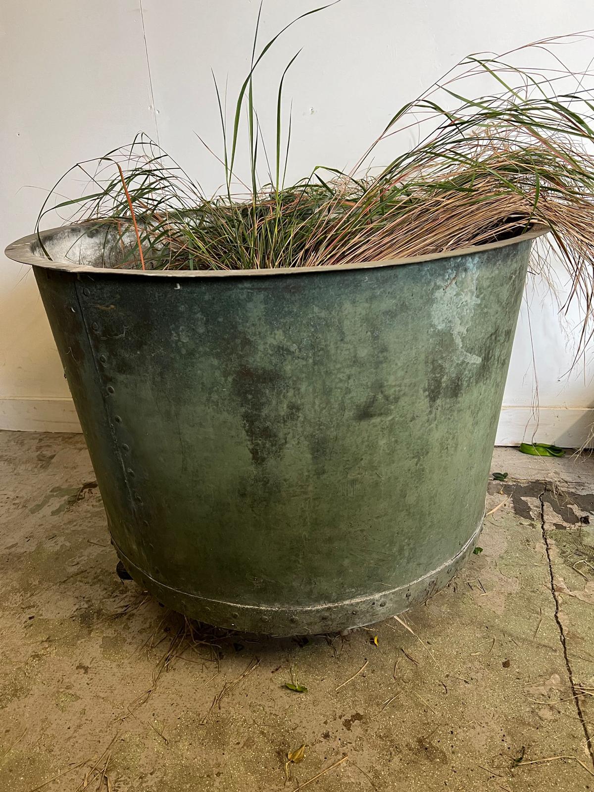 A large galvanised rivetted copper planter/cauldron (H68cm Dia89cm)