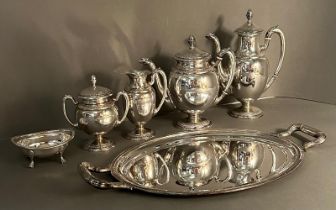 A continental silver tea and coffee service to include tray, tea and coffee pots and sugar bowl.