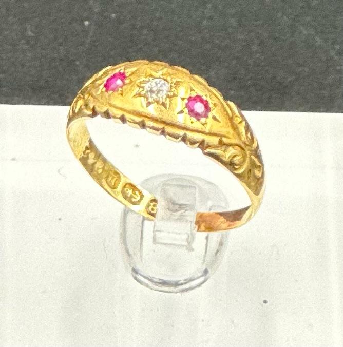 An antique 18ct gold diamond and ruby inset ring, approximate size m and weight 2.4g