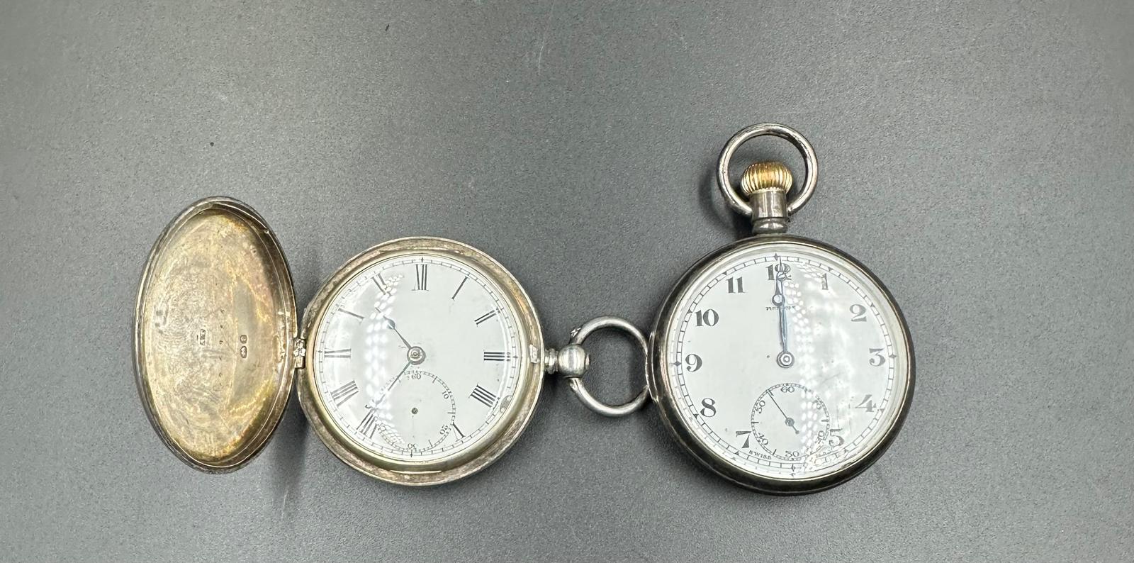 Two silver pocket watches, one by Pinnacle.