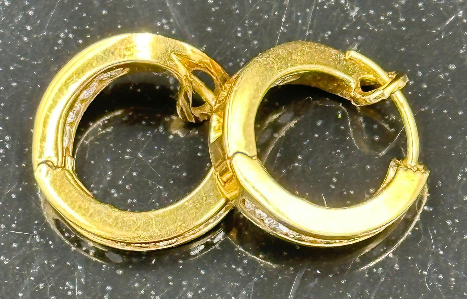 A Gold diamond hoop earrings mounted in 18ct gold. Signed T&Co. Total diamond weight approximately - Image 2 of 3