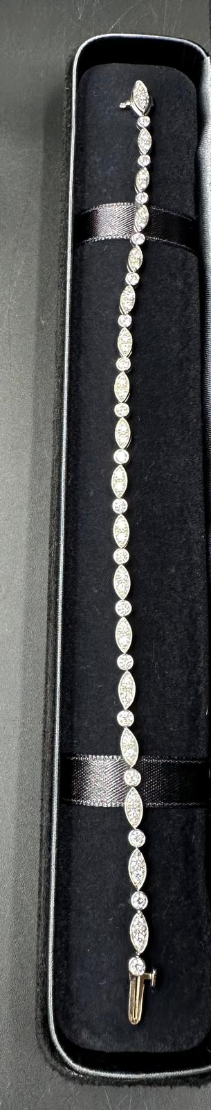 Tiffany diamond bracelet mounted in platinum. Signed Tiffany 950. Total diamond weight approximately - Image 4 of 7