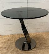A steel chrome systemic table with black glass (H53cm Dia60cm)