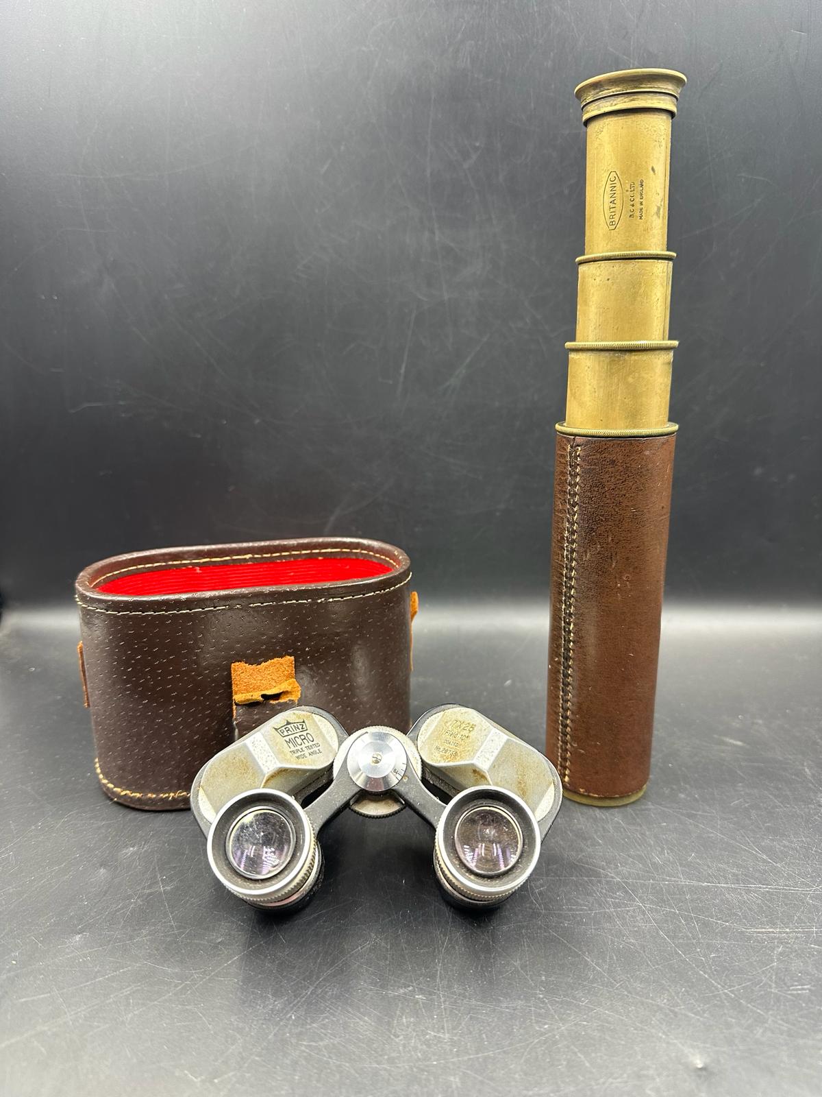 A pair of Prinz micro field binoculars and a Britannic brass telescope